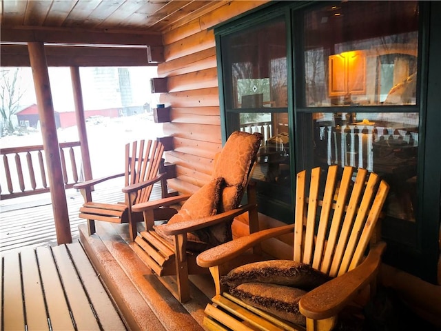 sunroom with wood ceiling