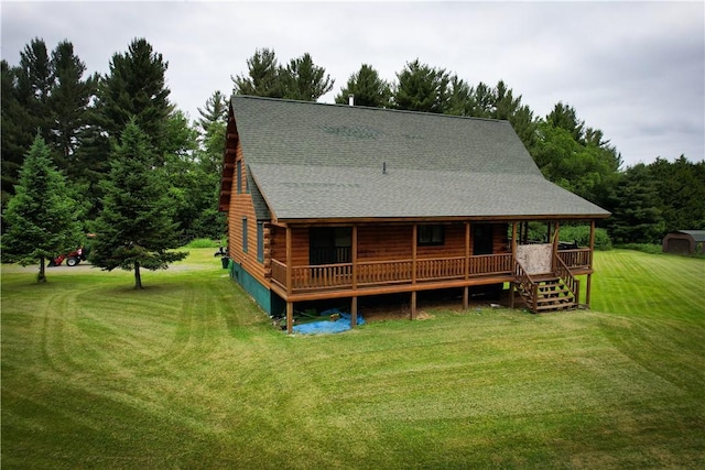 back of house featuring a yard