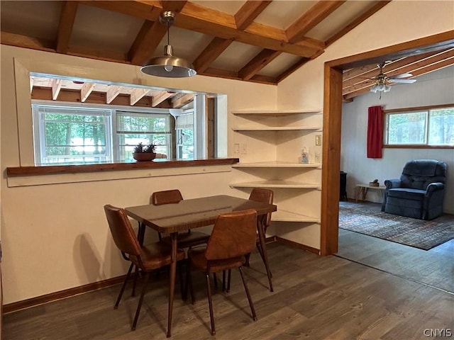 dining area with vaulted ceiling with beams, wood finished floors, and baseboards
