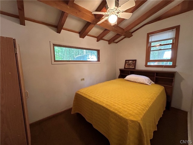 bedroom featuring ceiling fan and lofted ceiling with beams