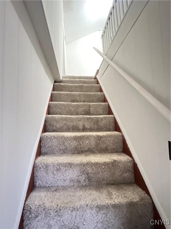 stairway with baseboards