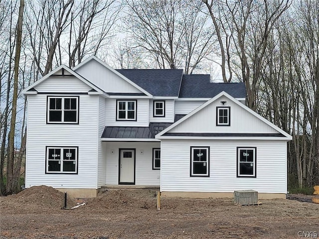 view of front of property with central AC unit