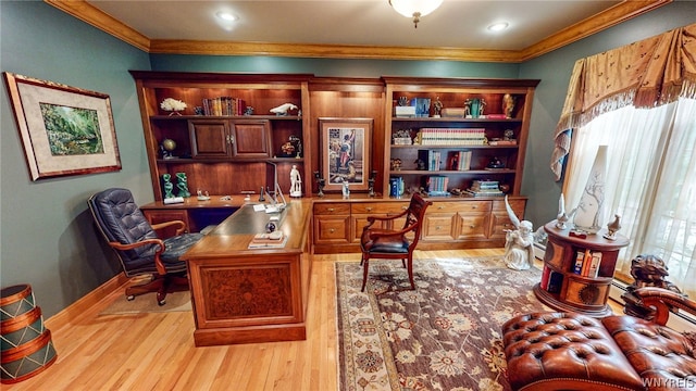 office featuring light wood-type flooring, baseboards, and ornamental molding