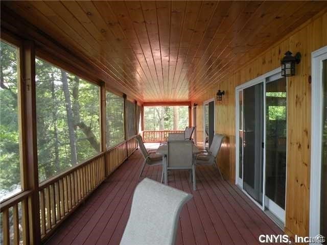 sunroom / solarium with wooden ceiling