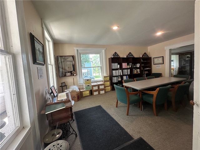 view of carpeted dining area