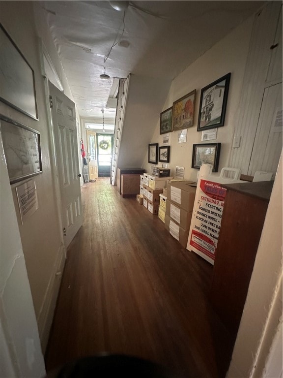 corridor featuring wood-type flooring