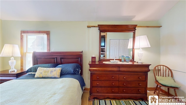 bedroom featuring wood-type flooring