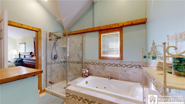 2638 Shadyside Rd, Mina, NY 14736 - bathroom with lofted ceiling, a tub with jets, connected bathroom, and a stall shower