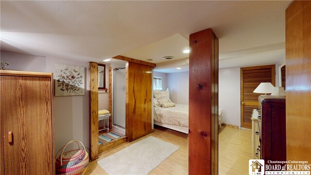 2638 Shadyside Rd, Mina, NY 14736 - ensuite bathroom with a shower stall, wood finished floors, connected bathroom, visible vents, and recessed lighting