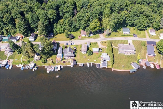 birds eye view of property featuring a water view