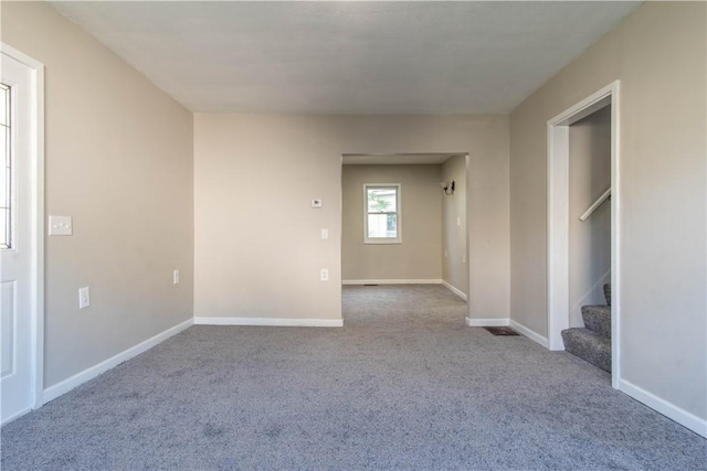 spare room with carpet floors