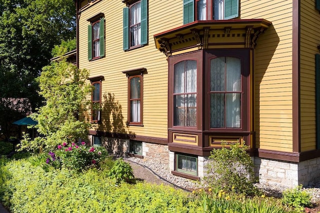 73 Elm St, Otsego, NY 13326 - view of side of property featuring stone siding