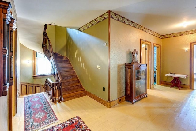 73 Elm St, Otsego, NY 13326 - stairway with wood finished floors and baseboards