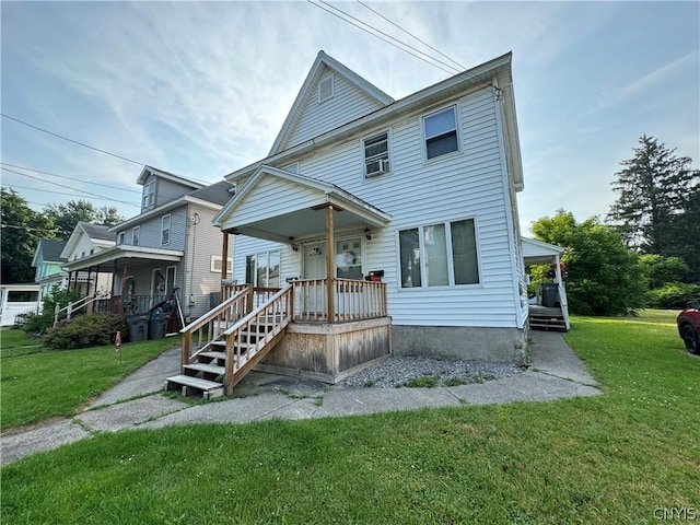 view of front of home featuring a front lawn and covered porch