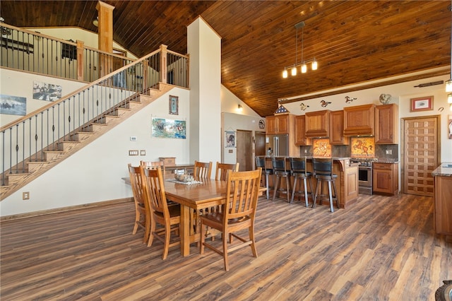 dining room with wood ceiling, dark wood-type flooring, and high vaulted ceiling