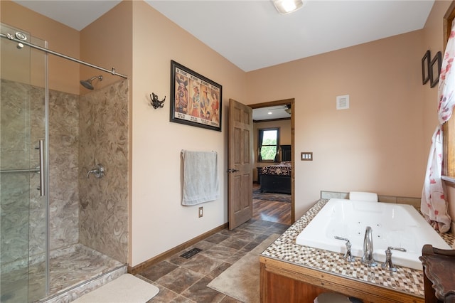 bathroom featuring plus walk in shower