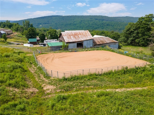 view of community featuring a mountain view and a rural view