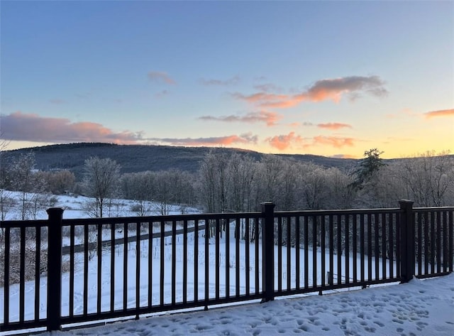 view of snow covered deck