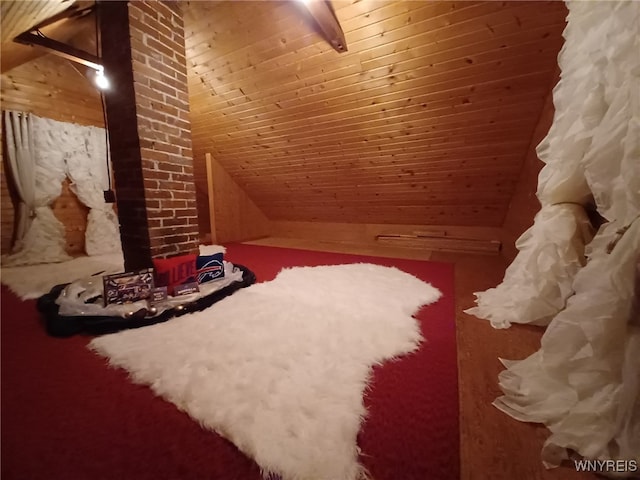 bedroom with wood ceiling and vaulted ceiling