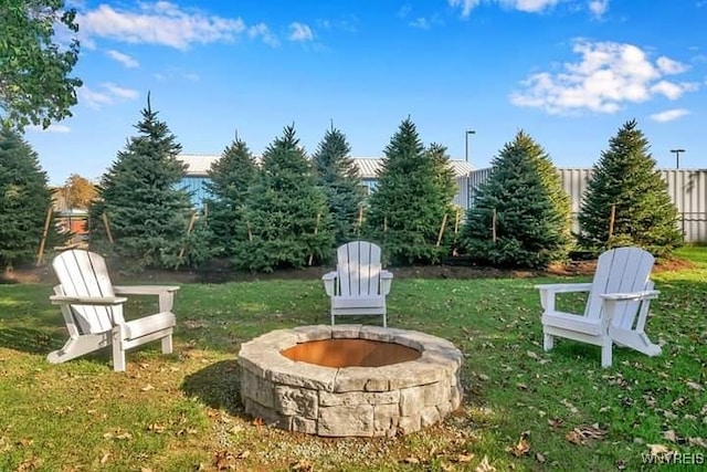 view of yard featuring a fire pit