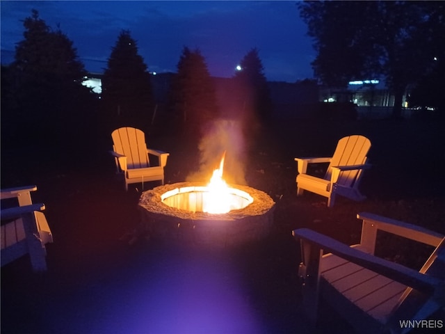 patio at twilight with a fire pit