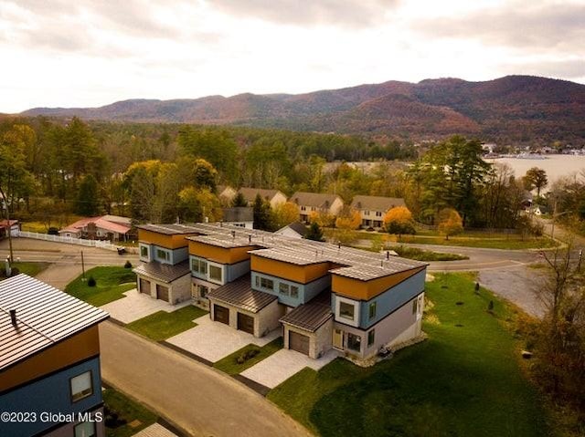 drone / aerial view featuring a mountain view