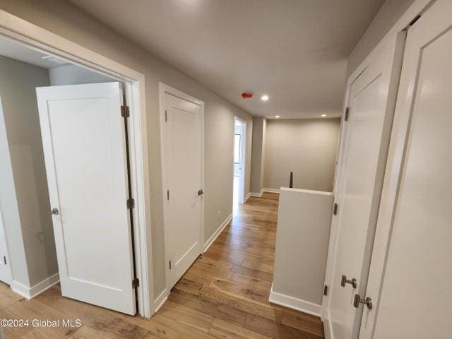 hallway featuring light hardwood / wood-style floors