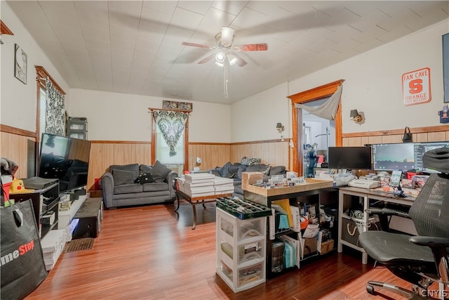 office area with ceiling fan and light hardwood / wood-style flooring