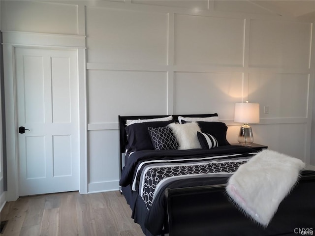 bedroom with light hardwood / wood-style floors