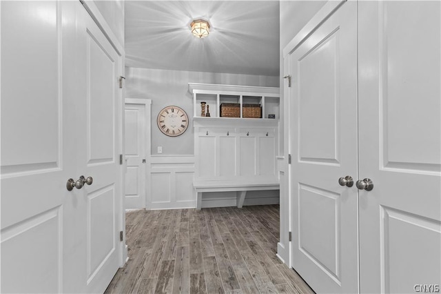 mudroom with light hardwood / wood-style floors