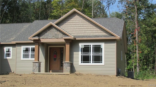 craftsman-style house featuring central air condition unit