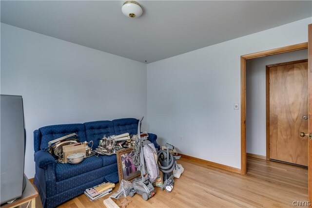 sitting room featuring light hardwood / wood-style flooring