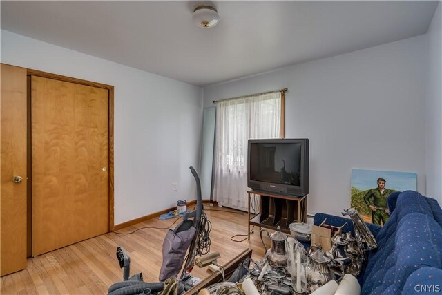 exercise room featuring hardwood / wood-style flooring