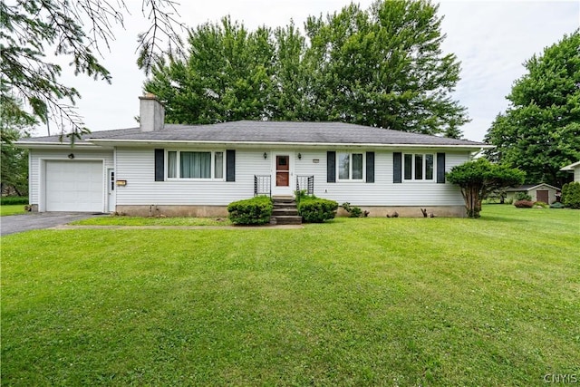 ranch-style house with a garage and a front yard