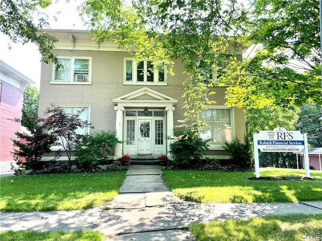 view of front of house featuring a front yard