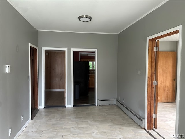 unfurnished bedroom with a baseboard radiator, light tile flooring, black refrigerator, and ensuite bath