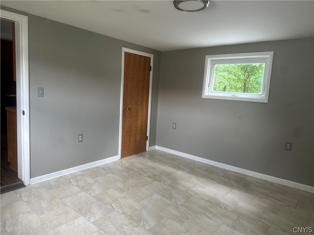 view of tiled spare room