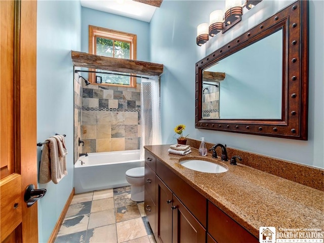 full bathroom featuring vanity, toilet, and tiled shower / bath