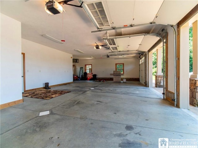 garage featuring a garage door opener