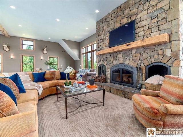 living room with a fireplace, carpet, and plenty of natural light