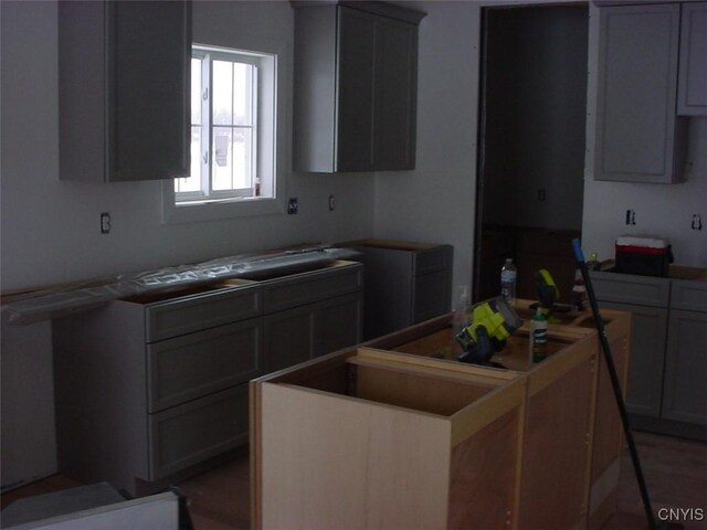 kitchen with gray cabinetry