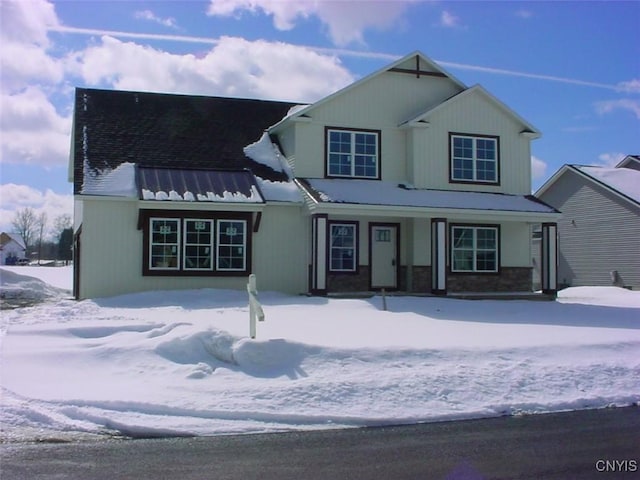 view of front of property featuring covered porch