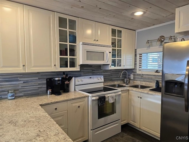 kitchen featuring white cabinets, backsplash, light stone counters, wood ceiling, and white appliances