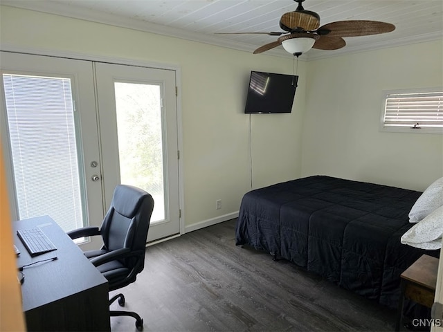 bedroom featuring access to exterior, wood-type flooring, multiple windows, and ceiling fan