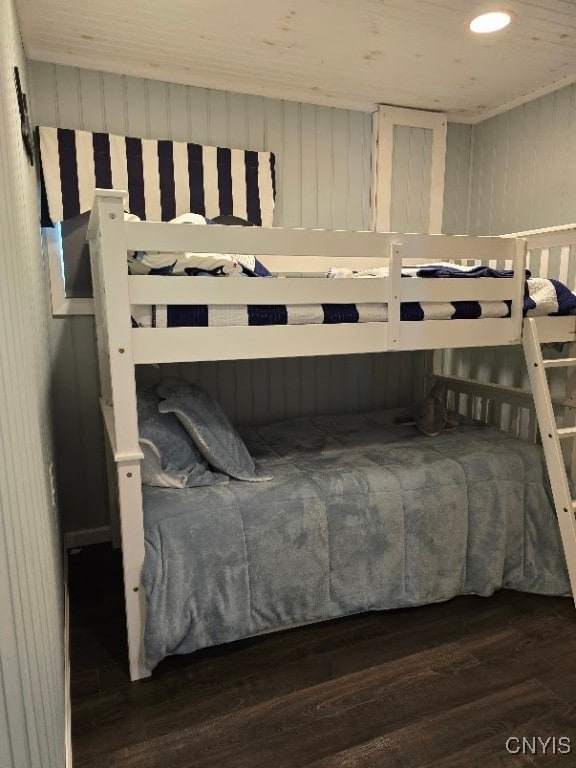 bedroom featuring dark wood-type flooring