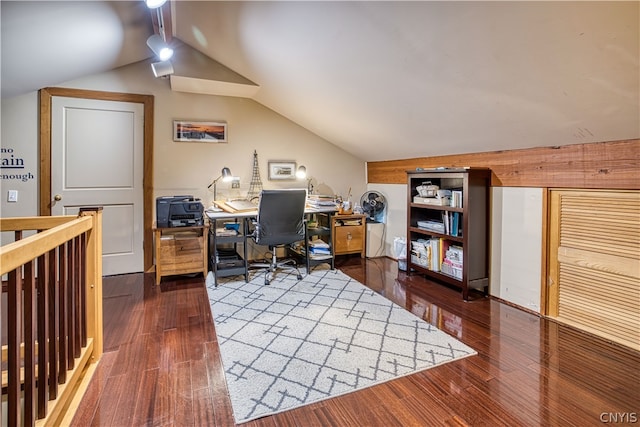 home office featuring hardwood / wood-style flooring and lofted ceiling