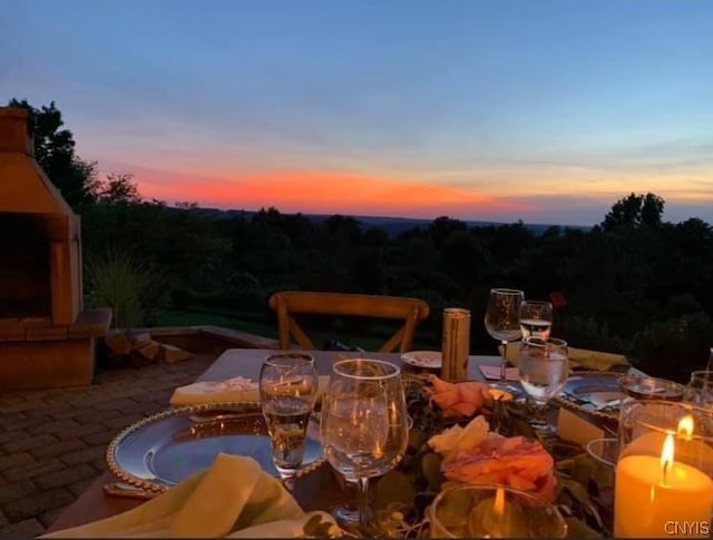 view of patio terrace at dusk