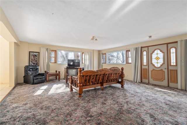 bedroom featuring light carpet