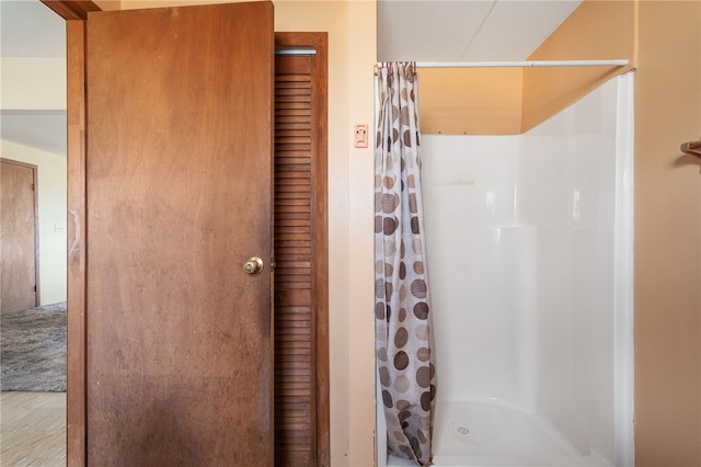 bathroom featuring walk in shower