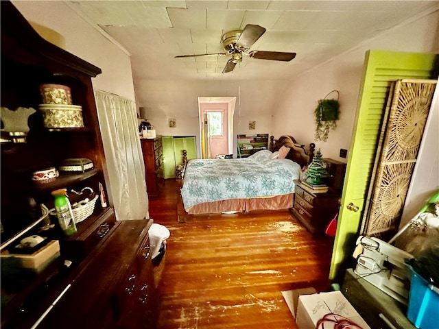 bedroom featuring ceiling fan and hardwood / wood-style flooring